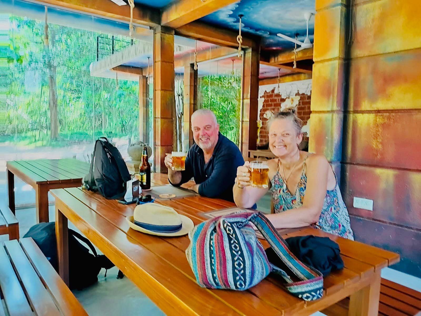 Guests toasting with beer in the restaurant