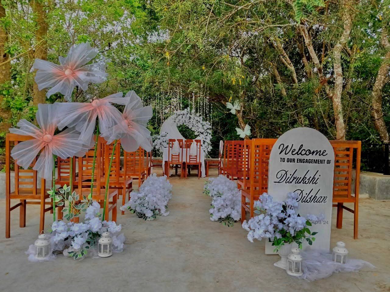 Decorated outdoor welcome for an engagement